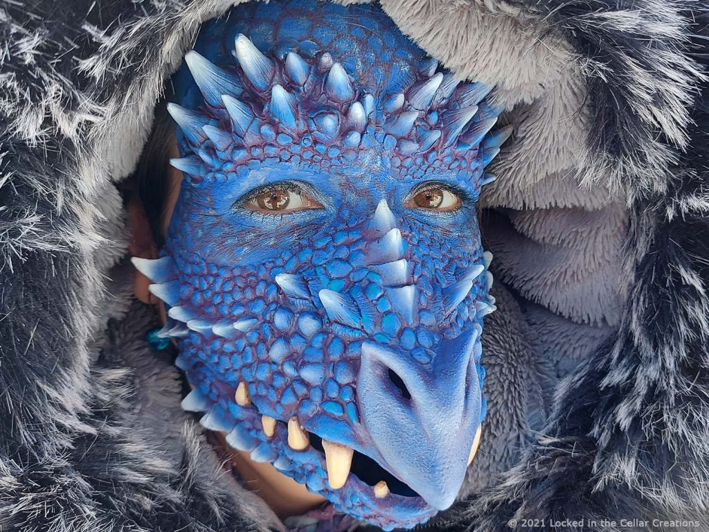 Add blue and purple face paint to your dragon face mask & forehead horns prosthetics and make your larp/cosplay look complete.